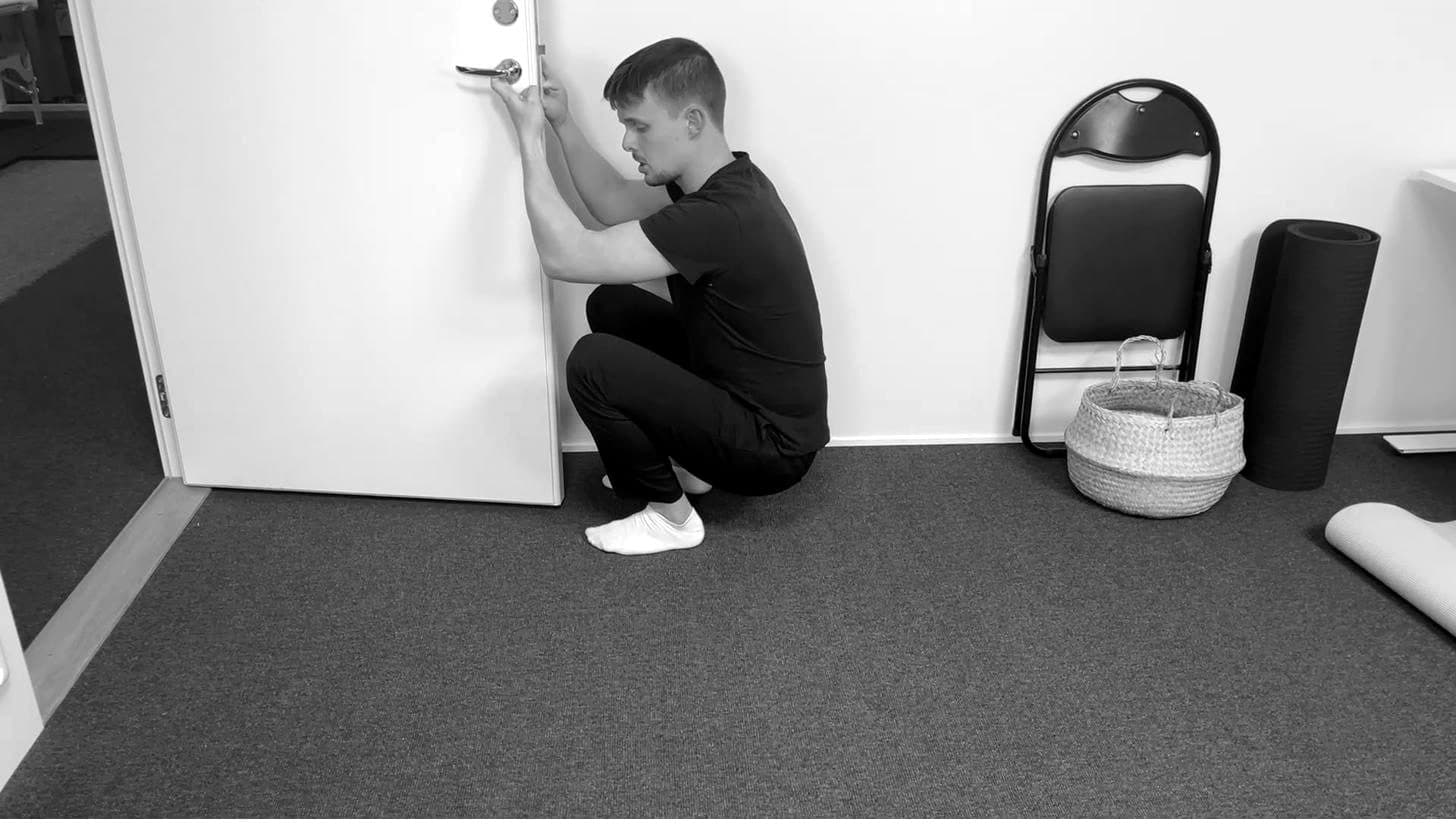 Squatting at Door